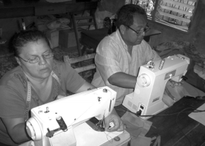 Juan Carlos and Migdalia in their home