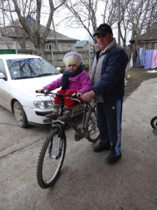 Taking his granddaughter to kindergarten