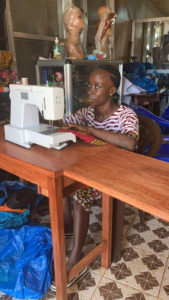 Woman sewing in Sierra Leone