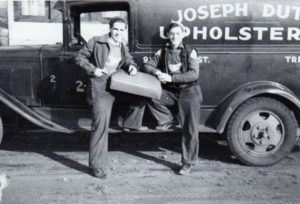 Dutko brothers with Upholstery Company truck