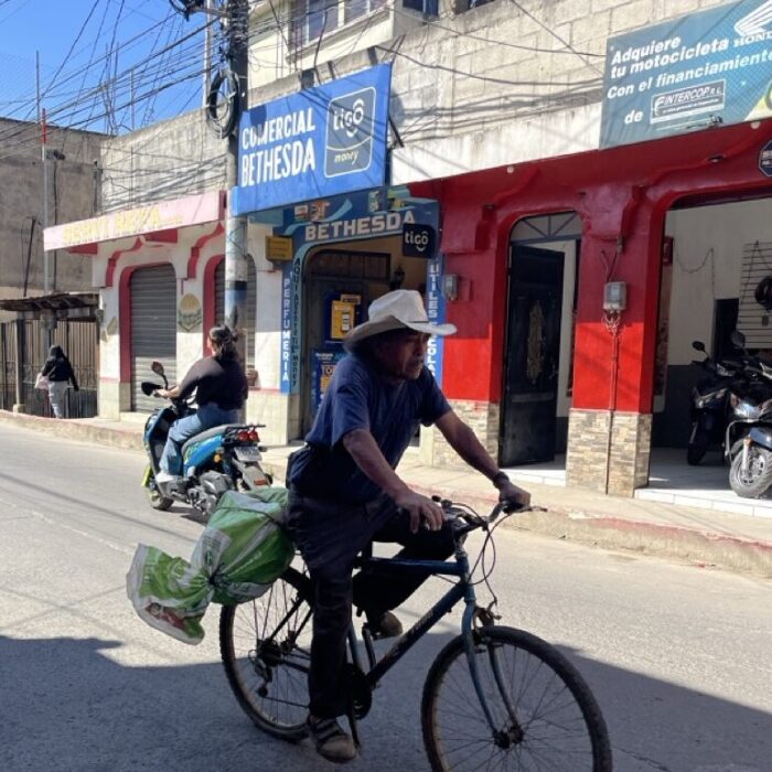 man riding bike, Guatemala 2025