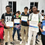 Belize, June 2025: boys with scholarships