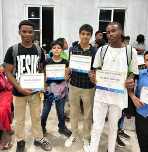 Belize, June 2025: boys with scholarships